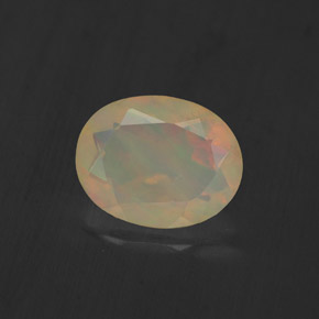 1.10캐럿 천연 멀티컬러 오팔, 투명한, 9×7.1 mm, 투명/반투명