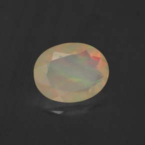 1.10캐럿 천연 멀티컬러 오팔, 투명한, 9×7.1 mm, 투명/반투명