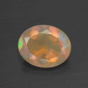 1.73캐럿 천연 멀티컬러 오팔, 타원형 컷, 10.2×8.1 mm, 투명한