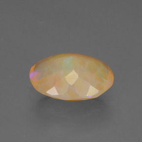 1.29캐럿 천연 멀티컬러 오팔, 타원형 컷, 9.7×7.5 mm, 투명한