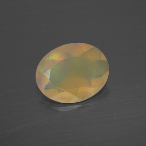 1.17캐럿 천연 멀티컬러 오팔, 타원형 컷, 10.1×8.1 mm, 투명한