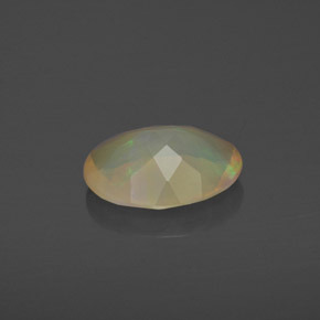 1.17캐럿 천연 멀티컬러 오팔, 타원형 컷, 10.1×8.1 mm, 투명한