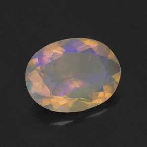 1.27캐럿 천연 멀티컬러 오팔, 타원형 컷, 10.1×7.7 mm, 투명한