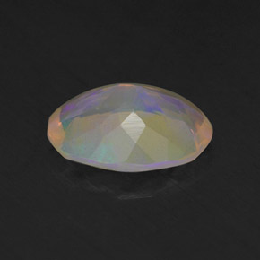 1.27캐럿 천연 멀티컬러 오팔, 타원형 컷, 10.1×7.7 mm, 투명한