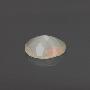 0.63캐럿 천연 멀티컬러 오팔, 투명한, 7.6×5.9 mm, 투명/반투명