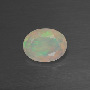 0.65캐럿 천연 멀티컬러 오팔, 투명한, 7.9×6.1 mm, 투명/반투명