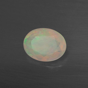 0.65캐럿 천연 멀티컬러 오팔, 투명한, 7.9×6.1 mm, 투명/반투명