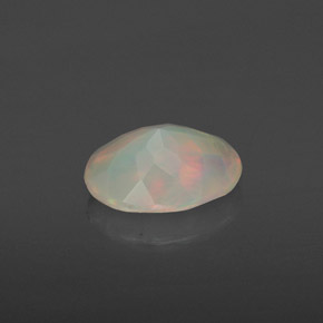 0.65캐럿 천연 멀티컬러 오팔, 투명한, 7.9×6.1 mm, 투명/반투명