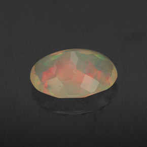 1.65캐럿 천연 멀티컬러 오팔, 타원형 컷, 10.9×8.3 mm, 투명한