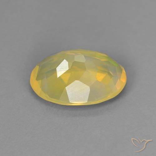 1.45캐럿 천연 멀티컬러 오팔, 타원형 컷, 10.4×7.4 mm, 투명한