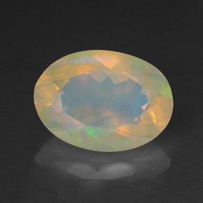 1.38캐럿 천연 멀티컬러 오팔, 타원형 컷, 9.9×7.2 mm, 투명한
