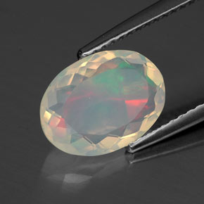 1.54캐럿 천연 멀티컬러 오팔, 타원형 컷, 10.8×7.8 mm, 투명한
