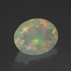 1.37캐럿 천연 멀티컬러 오팔, 타원형 컷, 10×8.1 mm, 투명한