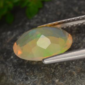 1.30캐럿 천연 멀티컬러 오팔, 타원형 컷, 10.1×8.2 mm, 투명한