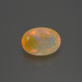 1.62캐럿 천연 멀티컬러 오팔, 타원형 컷, 10.7×7.7 mm, 투명한