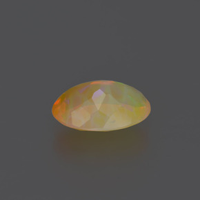 1.62캐럿 천연 멀티컬러 오팔, 타원형 컷, 10.7×7.7 mm, 투명한