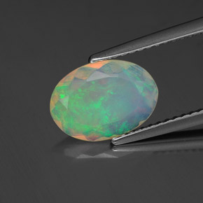 1.06캐럿 천연 멀티컬러 오팔, 투명한, 10.6×7.6 mm, 투명/반투명