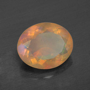 1.64캐럿 천연 멀티컬러 오팔, 타원형 컷, 9.9×8.2 mm, 투명한