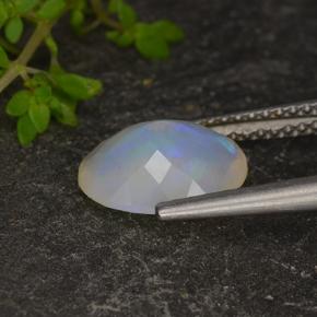 1.35캐럿 천연 멀티컬러 오팔, 타원형 컷, 10.2×8.1 mm, 투명한