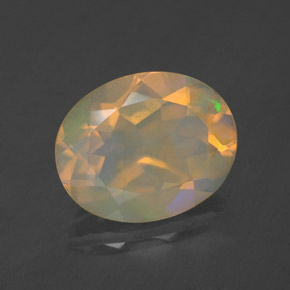 1.63캐럿 천연 멀티컬러 오팔, 타원형 컷, 10.1×8.1 mm, 투명한
