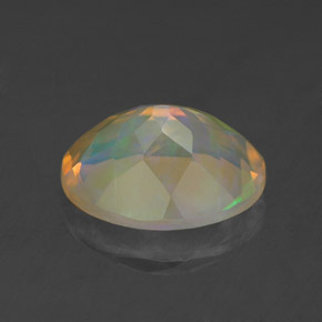 1.63캐럿 천연 멀티컬러 오팔, 타원형 컷, 10.1×8.1 mm, 투명한