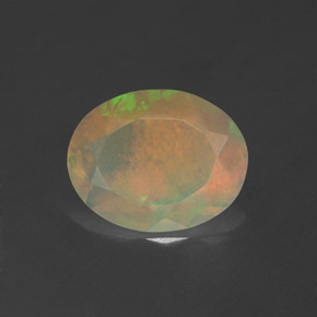 1.14캐럿 천연 멀티컬러 오팔, 타원형 컷, 9.9×7.8 mm, 투명한