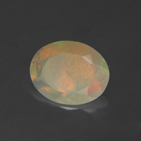 1.14캐럿 천연 멀티컬러 오팔, 타원형 컷, 9.9×7.8 mm, 투명한
