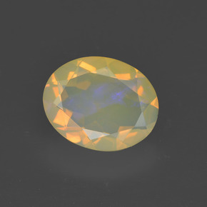 1.31캐럿 천연 멀티컬러 오팔, 타원형 컷, 10×8 mm, 투명한