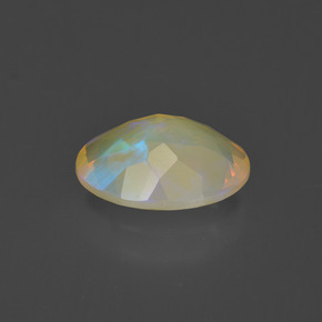 1.31캐럿 천연 멀티컬러 오팔, 타원형 컷, 10×8 mm, 투명한