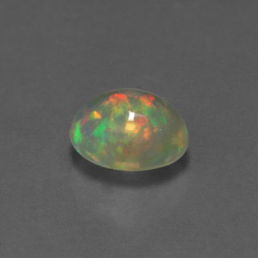1.11캐럿 천연 멀티컬러 오팔, 타원형 컷, 8.1×6.2 mm, 투명한