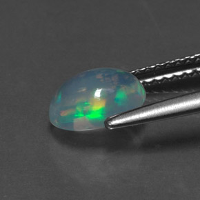 0.89캐럿 천연 멀티컬러 오팔, 타원형 컷, 8.1×6.1 mm, 투명한