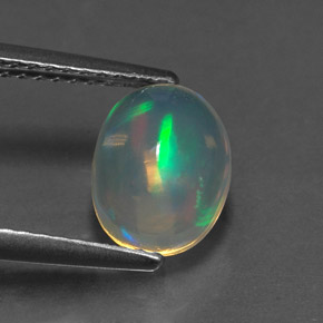 1.28캐럿 천연 멀티컬러 오팔, 타원형 컷, 9×6.9 mm, 투명한