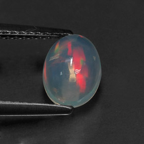 1.01캐럿 천연 멀티컬러 오팔, 타원형 컷, 8×6.1 mm, 투명한