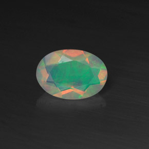 0.44캐럿 천연 멀티컬러 오팔, 타원형 컷, 7.1×5 mm, 투명한