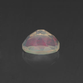 0.62캐럿 천연 멀티컬러 오팔, 타원형 컷, 6.9×5.1 mm, 투명한
