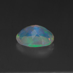 1.15캐럿 천연 멀티컬러 오팔, 타원형 컷, 9.1×7.1 mm, 투명한