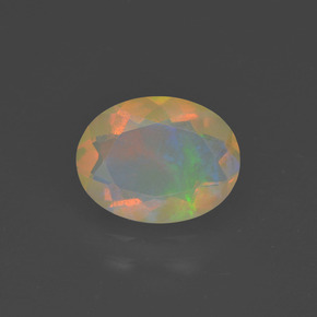 1.02캐럿 천연 멀티컬러 오팔, 타원형 컷, 9.1×7 mm, 투명한