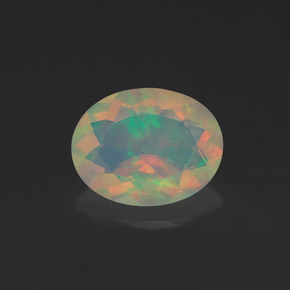 1.09캐럿 천연 멀티컬러 오팔, 타원형 컷, 9.1×7.1 mm, 투명한