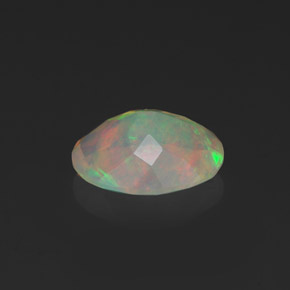 1.09캐럿 천연 멀티컬러 오팔, 타원형 컷, 9.1×7.1 mm, 투명한