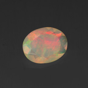 0.84캐럿 천연 멀티컬러 오팔, 타원형 컷, 9.1×7 mm, 투명한