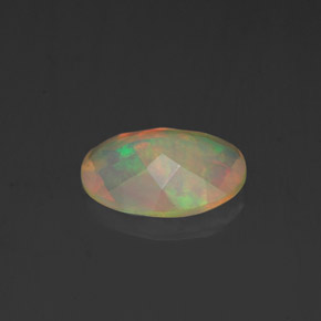 0.84캐럿 천연 멀티컬러 오팔, 타원형 컷, 9.1×7 mm, 투명한