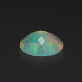 1.18캐럿 천연 멀티컬러 오팔, 타원형 컷, 9.1×7.2 mm, 투명한