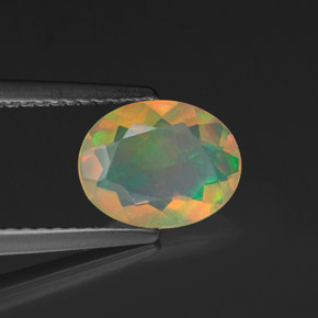 0.90캐럿 천연 멀티컬러 오팔, 타원형 컷, 8.9×7 mm, 투명한