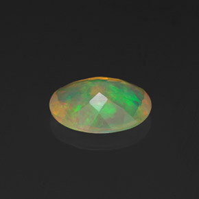 0.90캐럿 천연 멀티컬러 오팔, 타원형 컷, 8.9×7 mm, 투명한