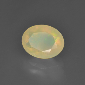 1.24캐럿 천연 멀티컬러 오팔, 타원형 컷, 9×7.1 mm, 투명한