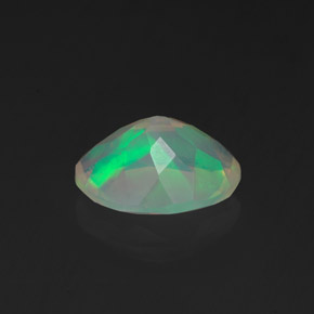 1.05캐럿 천연 멀티컬러 오팔, 타원형 컷, 9×7.1 mm, 투명한