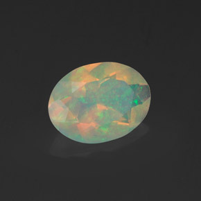 0.91캐럿 천연 멀티컬러 오팔, 타원형 컷, 9.1×6.8 mm, 투명한
