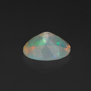 1.08캐럿 천연 멀티컬러 오팔, 타원형 컷, 9.1×7.1 mm, 투명한