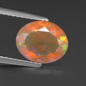 1.45캐럿 천연 멀티컬러 오팔, 타원형 컷, 9.9×8 mm, 투명한