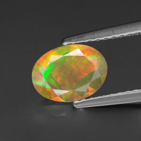 0.69캐럿 천연 멀티컬러 오팔, 타원형 컷, 8.1×6 mm, 투명한